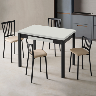 Mesa de cocina blanca y negra con  sillas y 2 taburetes con respaldo a juego. la mesa lleva cajón